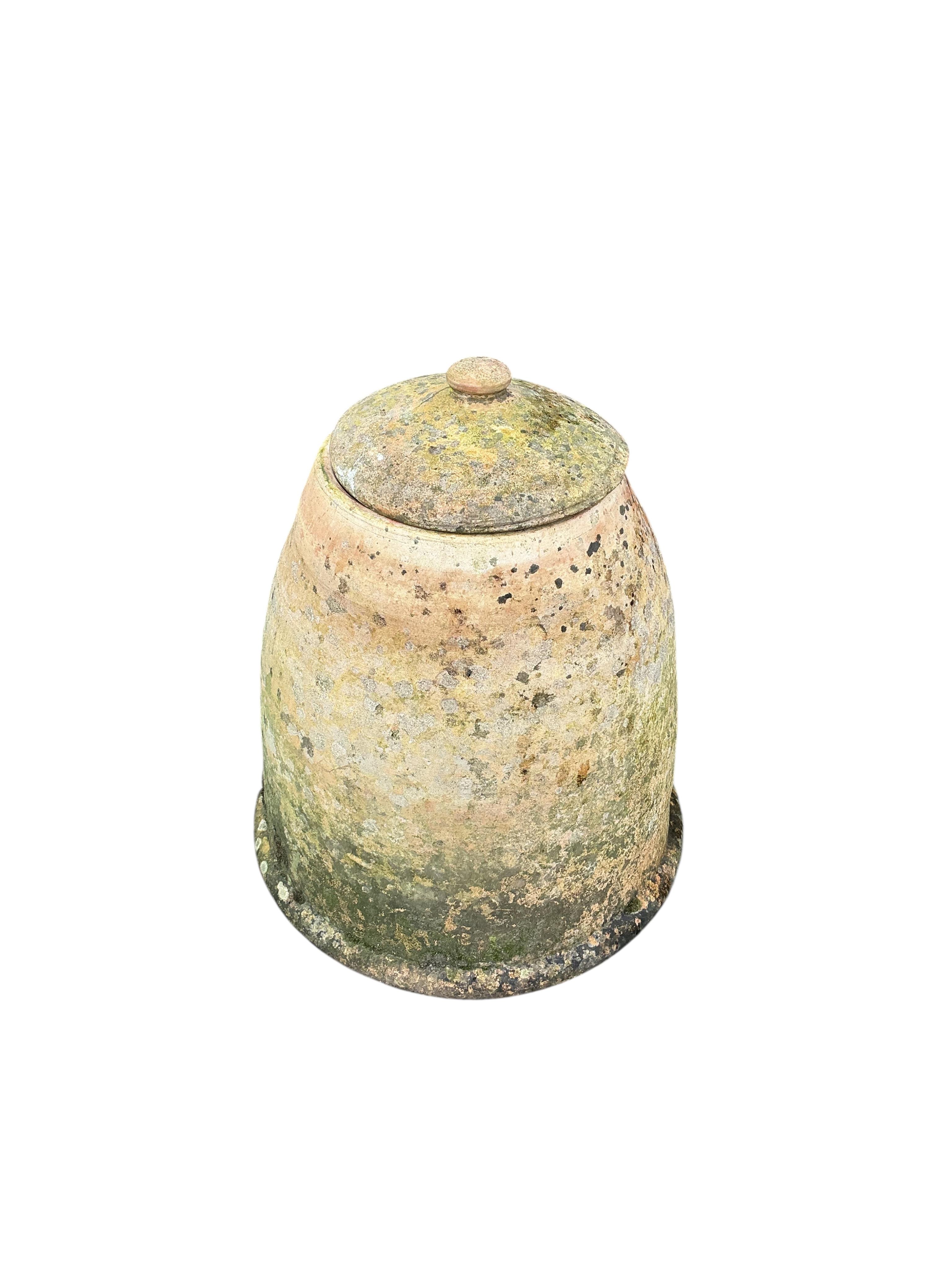 Two circular earthenware rhubarb forcers and covers, height 46cm